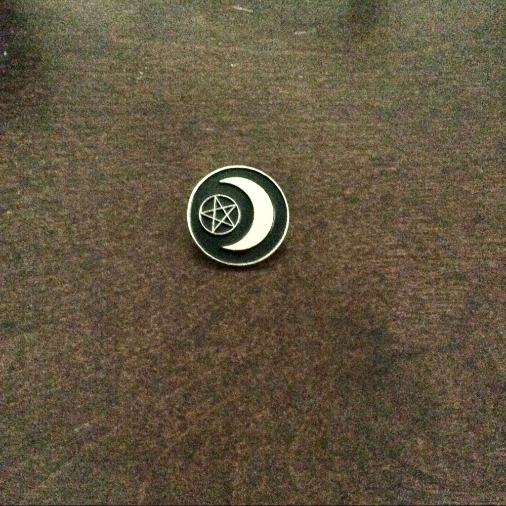 Crescent moon pentagram lapel pin.